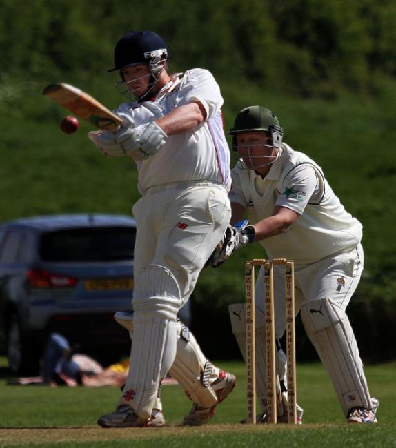 Tom Davies smashes another boundary in his superb innings of 83 for Carew