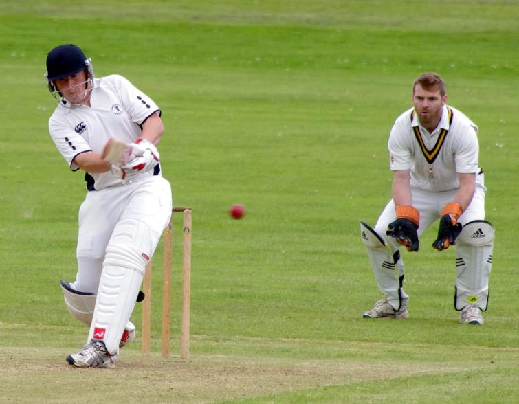 Tom Pearce hits a boundary for Haverfordwest 2nds