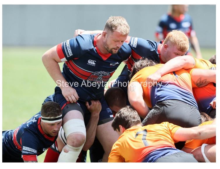 Tom Kaijaks propping against The Jaguares