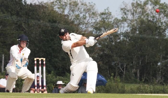 The ball flies off the bat of Ross Hardy