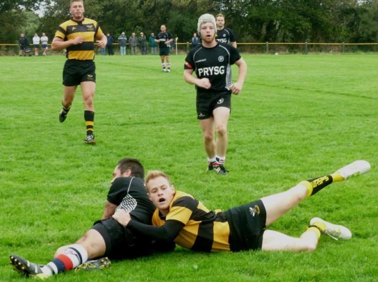 Kieran Walkden makes a try-saving tackle