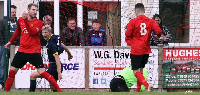 Tristan Hancock celebrates scoring St Clears fourth goal at Carew