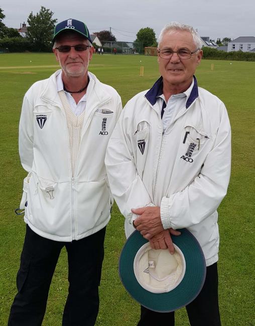 Umpires Simon Richards and Robert  Ridge