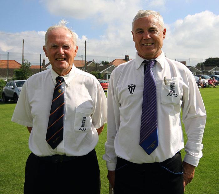 Umpires Tony Waldeis and Robert Ridge