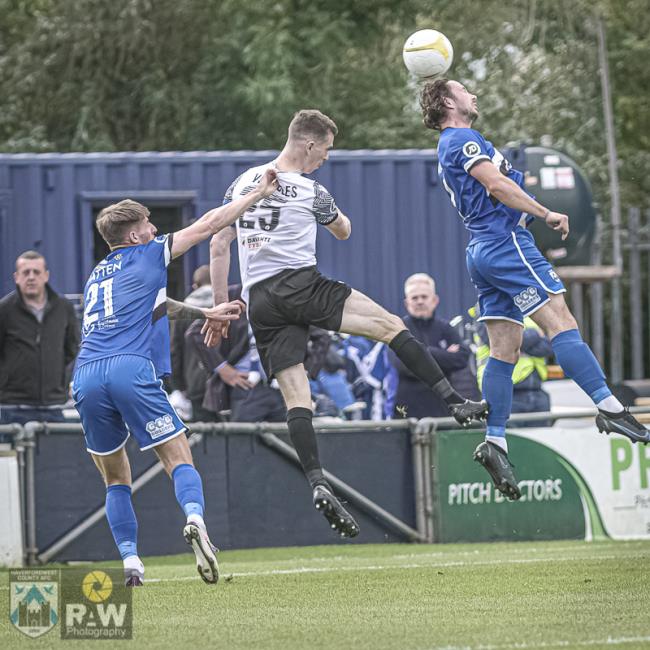 Ricky Watts gets vital header with Crhis Venables lurking