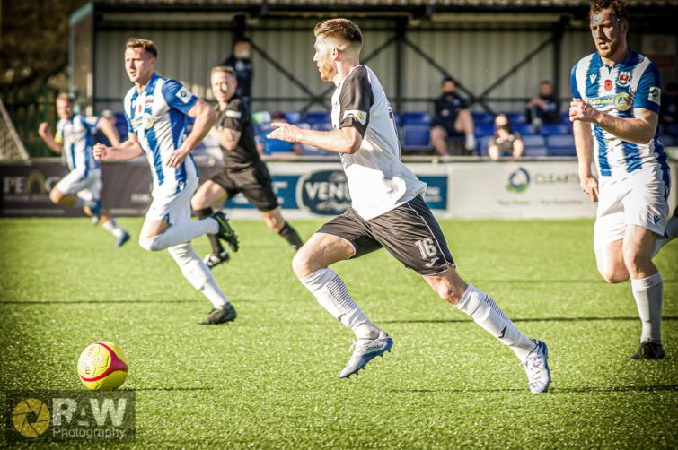 Kieran Lewis breaks for Haverfordwest County