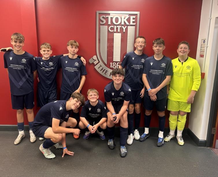 More of the Pembrokeshire Schools Under-14 players pose with the Stoke City badge